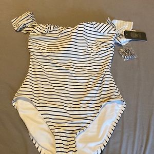 Full swimsuit for Lady.  New with labels.  size 10 brand Vince Camuto.